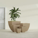 Lima Tapered Square fiberglass planter in Gloss Metallic Gold, size range, in a sunlit interior