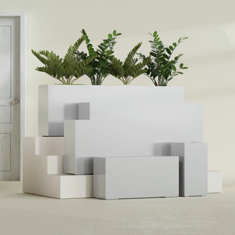Hollywood Corner fiberglass planter in Metallic Silver, size range, in a sunlit interior