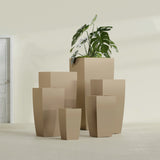 Toulan Tapered Square fiberglass planter in Gloss Metallic Gold, size range, in a sunlit interior