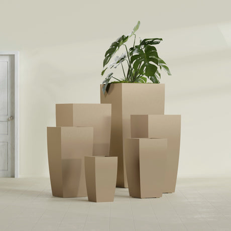 Toulan Tapered Square fiberglass planter in Gloss Metallic Gold, size range, in a sunlit interior