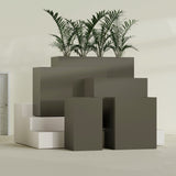 Darwin Rectangular fiberglass planter in Matte Bronze, size range, in a sunlit interior