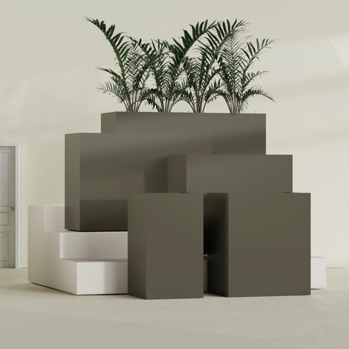 Darwin Corner fiberglass planter in Matte Bronze, size range, in a sunlit interior