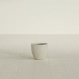 Wannsee Round Planter in Satin Beige, 15"D × 13"H, shown empty