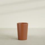 Tegel Round Tapered Planter in Matte Terra Cotta, 18"D × 26"H, shown empty