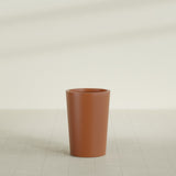 Tegel Round Tapered Planter in Matte Terra Cotta, 18"D × 26"H, shown empty