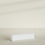 Salon Box Planter in Matte Bright White, 36" Long, shown empty