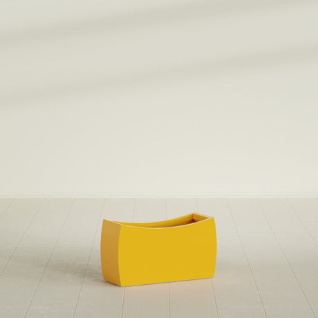 Seoul Curved Planter in Gloss Saffron, 32"L × 12"D × 18"H, shown empty