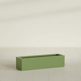 Cuba Low Rectangular Planter in Satin Green, 48"L × 14"D × 12"H, shown empty