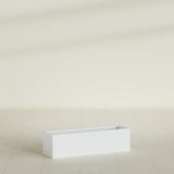 Monaco Rectangle Planter in Gloss Bright White, 26"L, shown empty