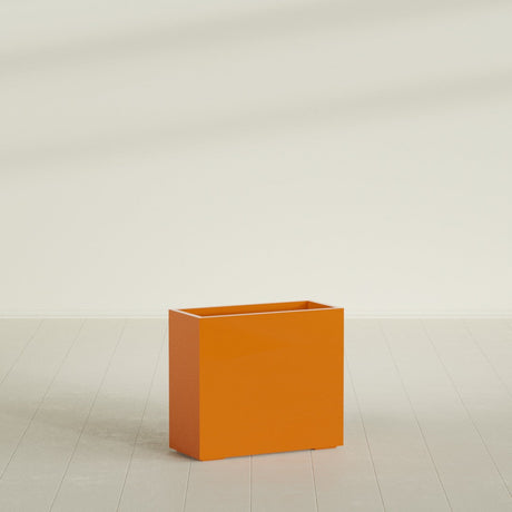 Potsdam Rectangular Planter in Gloss Tangerine, 36"L × 16"D × 32"H, shown empty