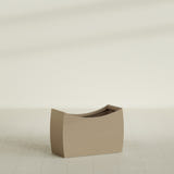 Seoul Curved Planter in Gloss Metallic Gold, 36"L × 16"D × 24"H, shown empty