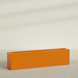 Miami Narrow Rectangular Planter in Gloss Tangerine, 72"L × 12"D × 18"H, shown empty
