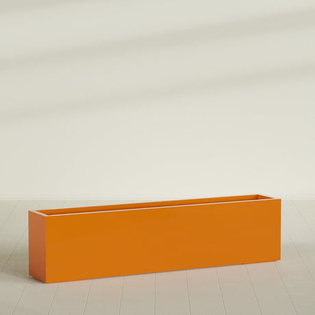 Miami Narrow Rectangular Planter in Gloss Tangerine, 72"L × 12"D × 18"H, shown empty