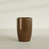 Lisbon tall round tapered fiberglass planter in Metallic Bronze, 24 in diameter, 36 in high, shown empty