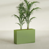 Potsdam Corner fiberglass planter in Satin Green, shown planted, in a sunlit interior