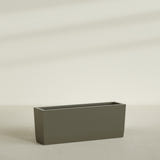 Panama Tapered Rectangular Planter in Matte Bronze, 48"L × 12"D × 18"H, shown empty
