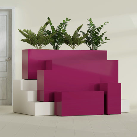 Hollywood Corner fiberglass planter in Gloss Eggplant, size range, in a sunlit interior