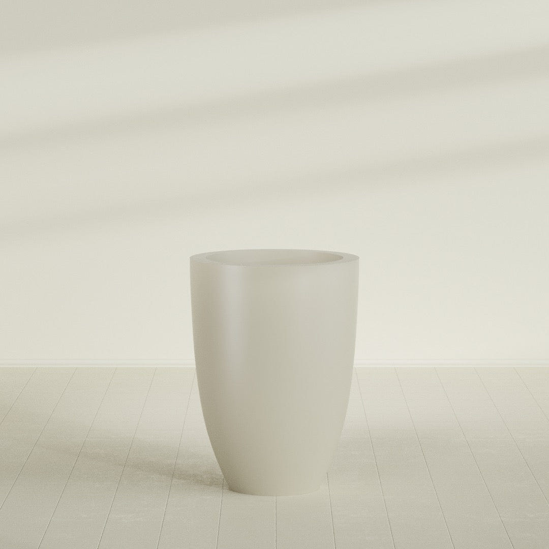 Brannan Tapered Round Planter in Satin Beige, 30"D × 41"H, shown empty
