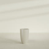 Brannan Tapered Round Planter in Satin Beige, 18"D × 29"H, shown empty