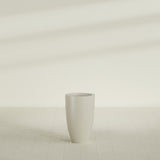 Brannan Tapered Round Planter in Satin Beige, 18"D × 29"H, shown empty