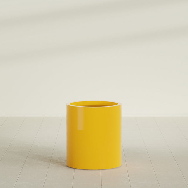 Rio Grande Cylinder Planter in Gloss Saffron, 18"D × 20"H, shown empty