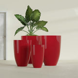 Brannan Tapered Round fiberglass planter in Gloss Red, size range, in a sunlit interior
