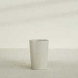 Tegel Round Tapered Planter in Satin Beige, 18"D × 26"H, shown empty