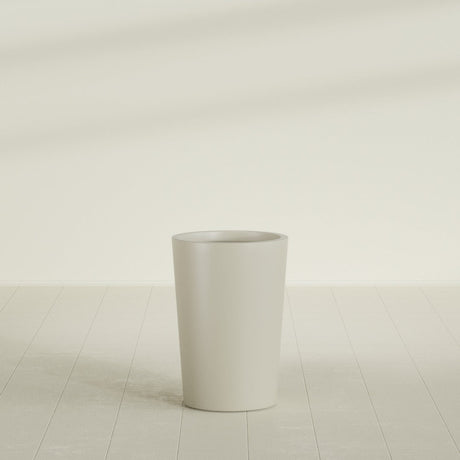 Tegel Round Tapered Planter in Satin Beige, 18"D × 26"H, shown empty
