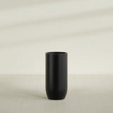 Saint Tropez Bullet Round Planter in Matte Black, 24"D × 50"H, shown empty
