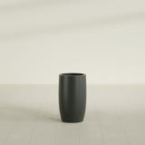 Lisbon tall round tapered fiberglass planter in Matte Charcoal, 14 in diameter, 25 in high, shown empty