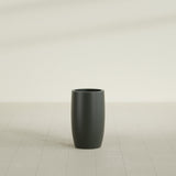 Lisbon tall round tapered fiberglass planter in Matte Charcoal, 14 in diameter, 25 in high, shown empty