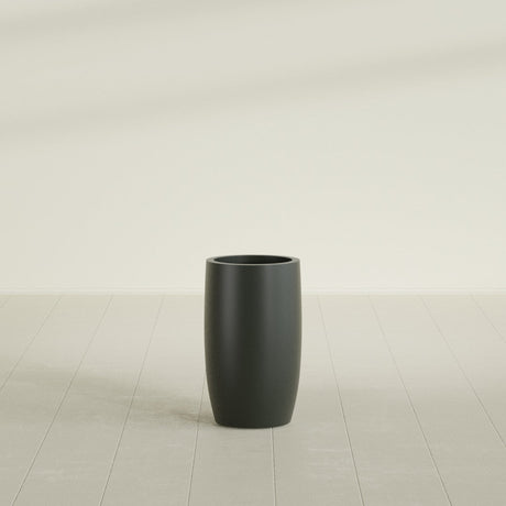 Lisbon tall round tapered fiberglass planter in Matte Charcoal, 14 in diameter, 25 in high, shown empty