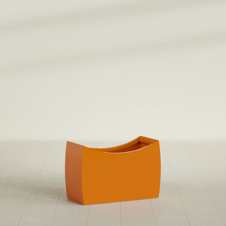 Seoul Curved Planter in Gloss Tangerine, 36"L × 16"D × 24"H, shown empty
