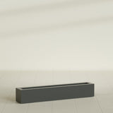 Salon Box Planter in Matte Charcoal, 48" Long, shown empty