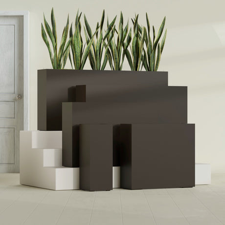 Delray Corner fiberglass planter in Matte Dark Brown, size range, in a sunlit interior