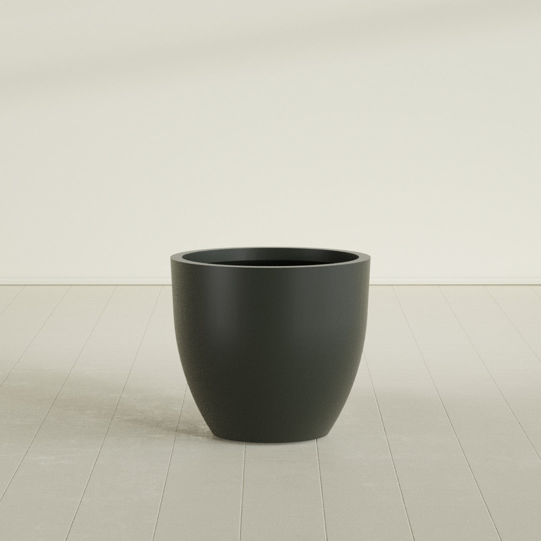 Wannsee Round Planter in Matte Charcoal, 33"D × 29"H, shown empty