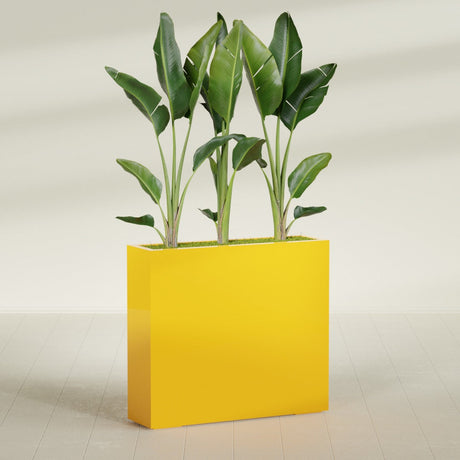 Amesbury Narrow Rectangular fiberglass planter in Gloss Saffron, shown planted, in a sunlit interior