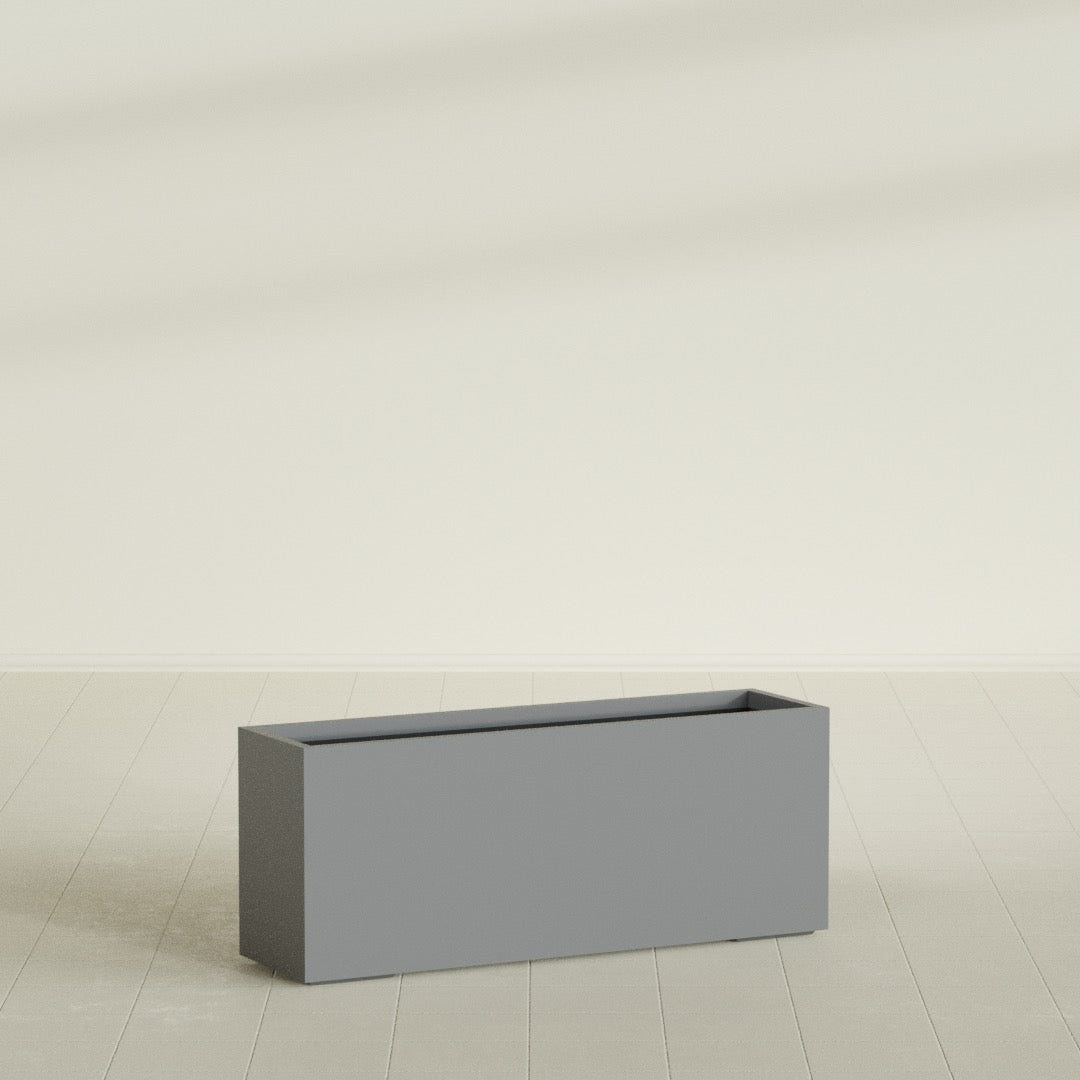 Tolga Rectangular Planter in Matte Gunmetal, 60"L × 16"D × 24"H, shown empty