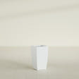Toulan Tapered Square Planter in Matte Bright White, 12"W × 22"H, shown empty