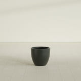 Wannsee Round Planter in Matte Charcoal, 22"D × 19"H, shown empty