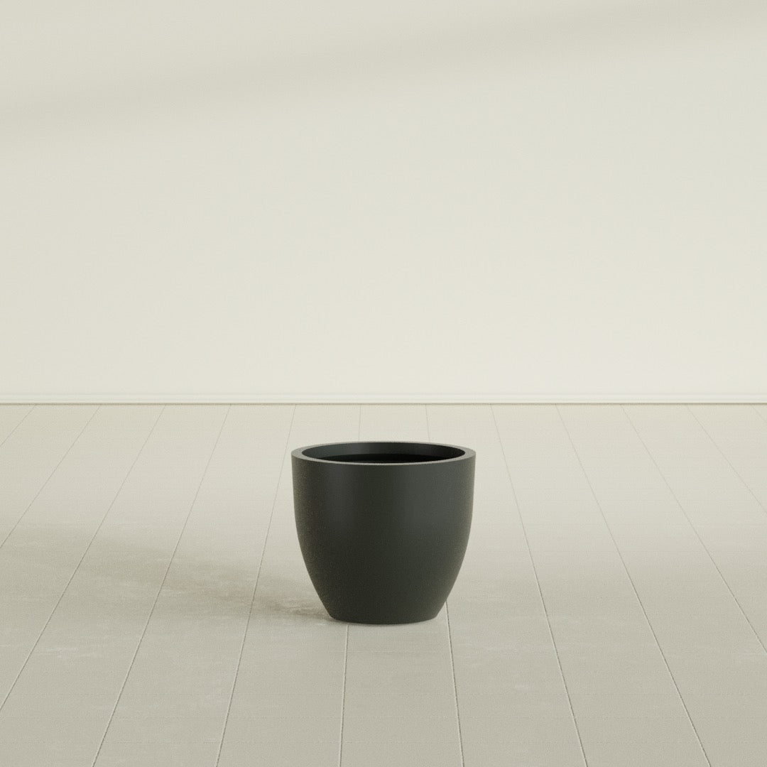 Wannsee Round Planter in Matte Charcoal, 22"D × 19"H, shown empty