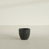 Wannsee Round Planter in Matte Charcoal, 22"D × 19"H, shown empty
