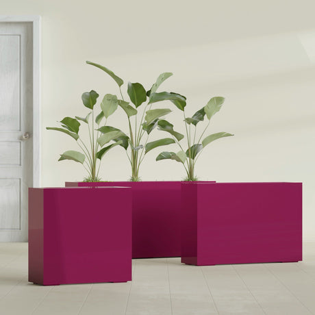 Milano Narrow Rectangular fiberglass planter in Gloss Eggplant, shown planted, in a sunlit interior