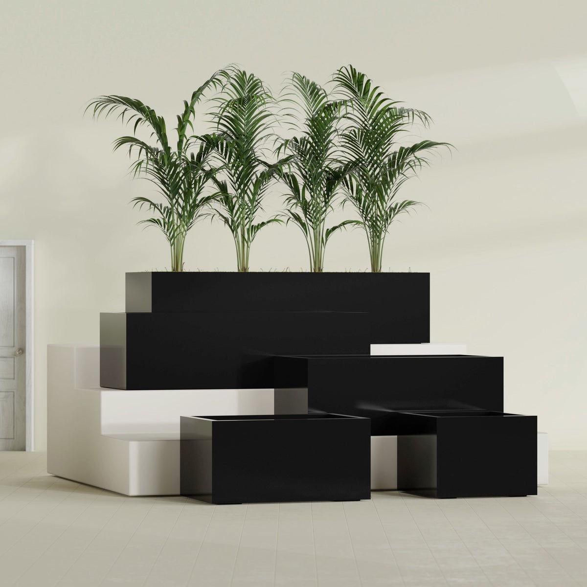 Torino fiberglass planters arranged in a sunlit interior