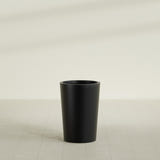 Tegel Round Tapered Planter in Matte Black, 18"D × 26"H, shown empty