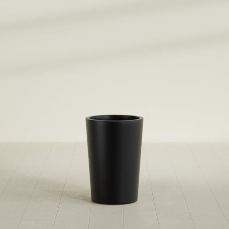 Tegel Round Tapered Planter in Matte Black, 18"D × 26"H, shown empty