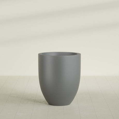 Valencia Tapered Round Planter in Matte Gunmetal, 27"D × 31"H, shown empty
