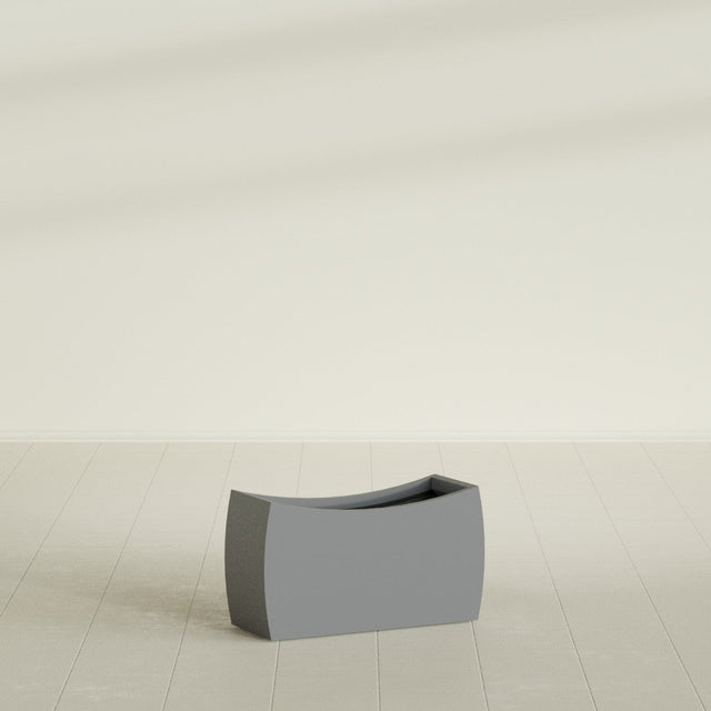 Seoul Curved Planter in Matte Gunmetal, 32"L × 12"D × 18"H, shown empty