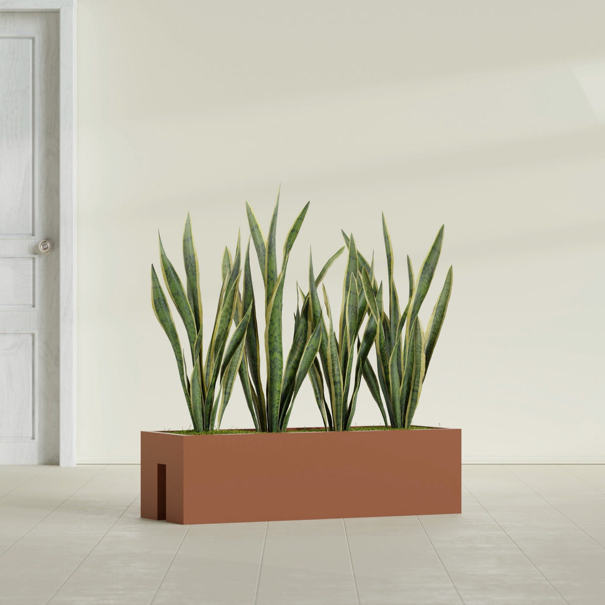 Tiergarden Railing fiberglass planter in Matte Terra Cotta, shown planted, in a sunlit interior