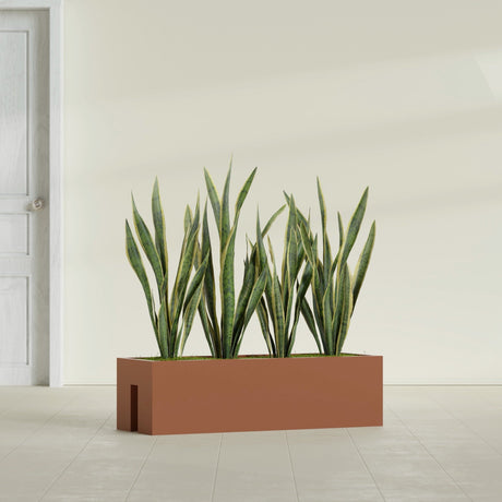 Tiergarden Railing fiberglass planter in Matte Terra Cotta, shown planted, in a sunlit interior